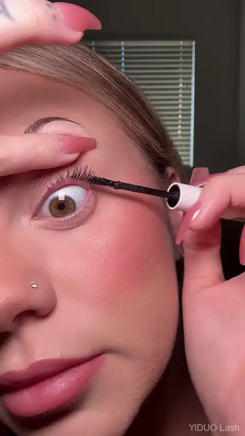 Applying lash cluster bond like light mascara for DIY extensions